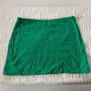 Green short skirt with small slit